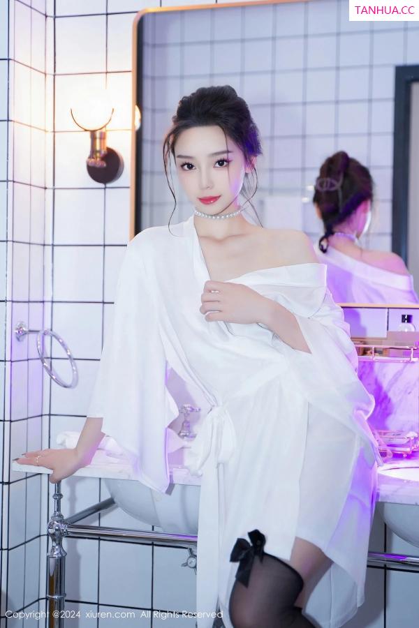   [XiuRen]高清写真图 2024.03.25 No.8283 苏曼兮 黑丝美腿第20张图片